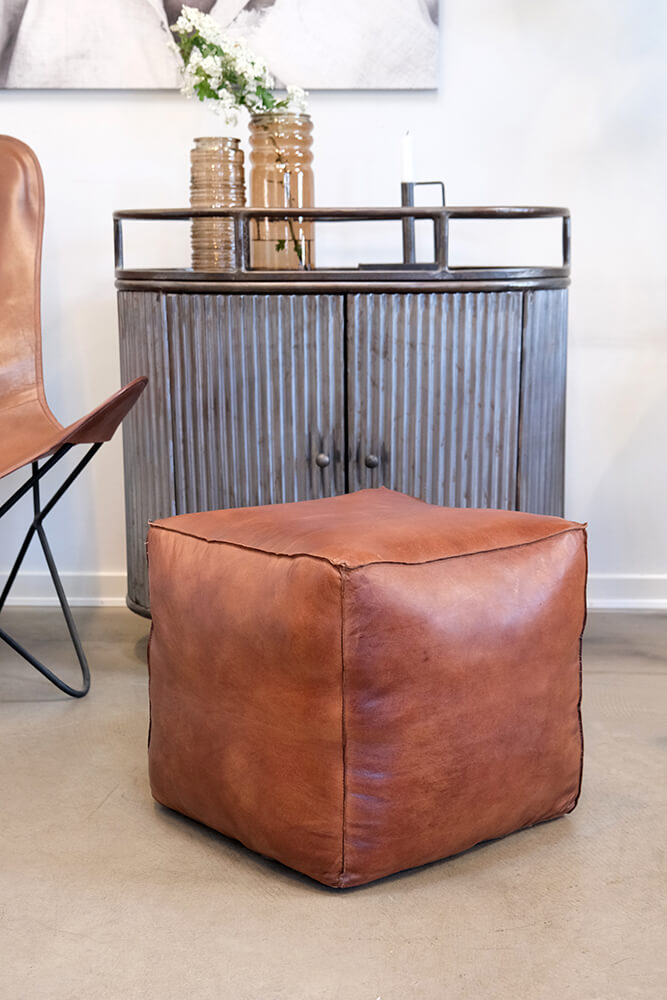 Tazi sittpuff läder